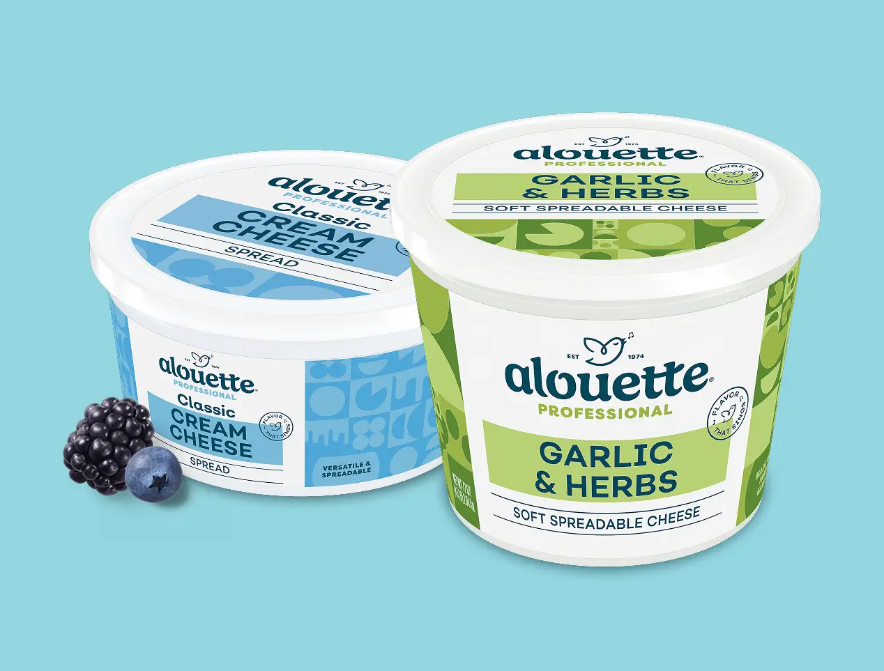 Two Alouette Professional soft spreadable cheese containers on turquoise background: Classic Cream Cheese with berries, and Garlic & Herbs flavors.